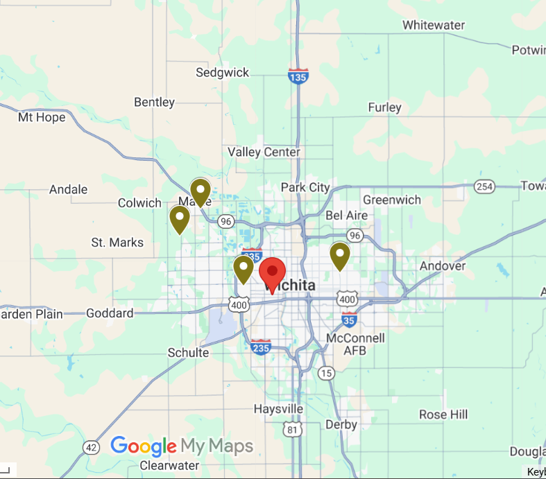 Resident celebrating with joy at our care home - wearing party hat and novelty glasses